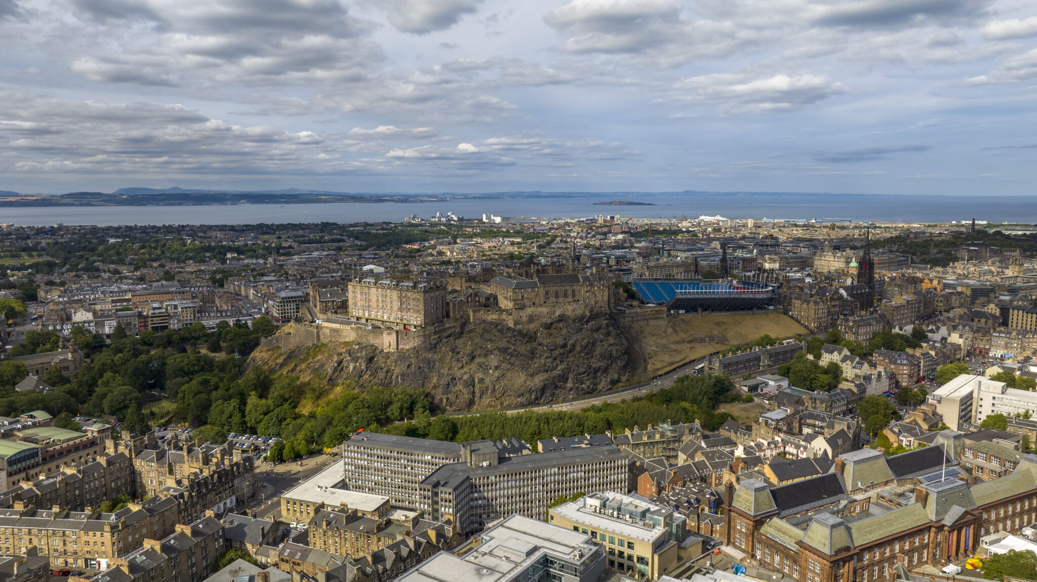 Edinburgh Castle and the city stretching to the Firth of Forth, from the air